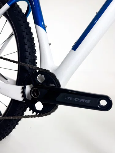 Bicicleta Colli Zurich Comp SH Carbono A.29 2026 Branco/Azul/Preto DEORE Tamanho M