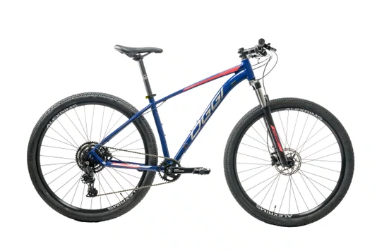 Bicicleta Oggi Aro 29 BW 7.0 Cues 9V Azul/Vermelho 15,5 2026